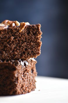 pexels photo 30924031 30924031 Indulgent chocolate brownies with nuts on top, perfect for dessert lovers.